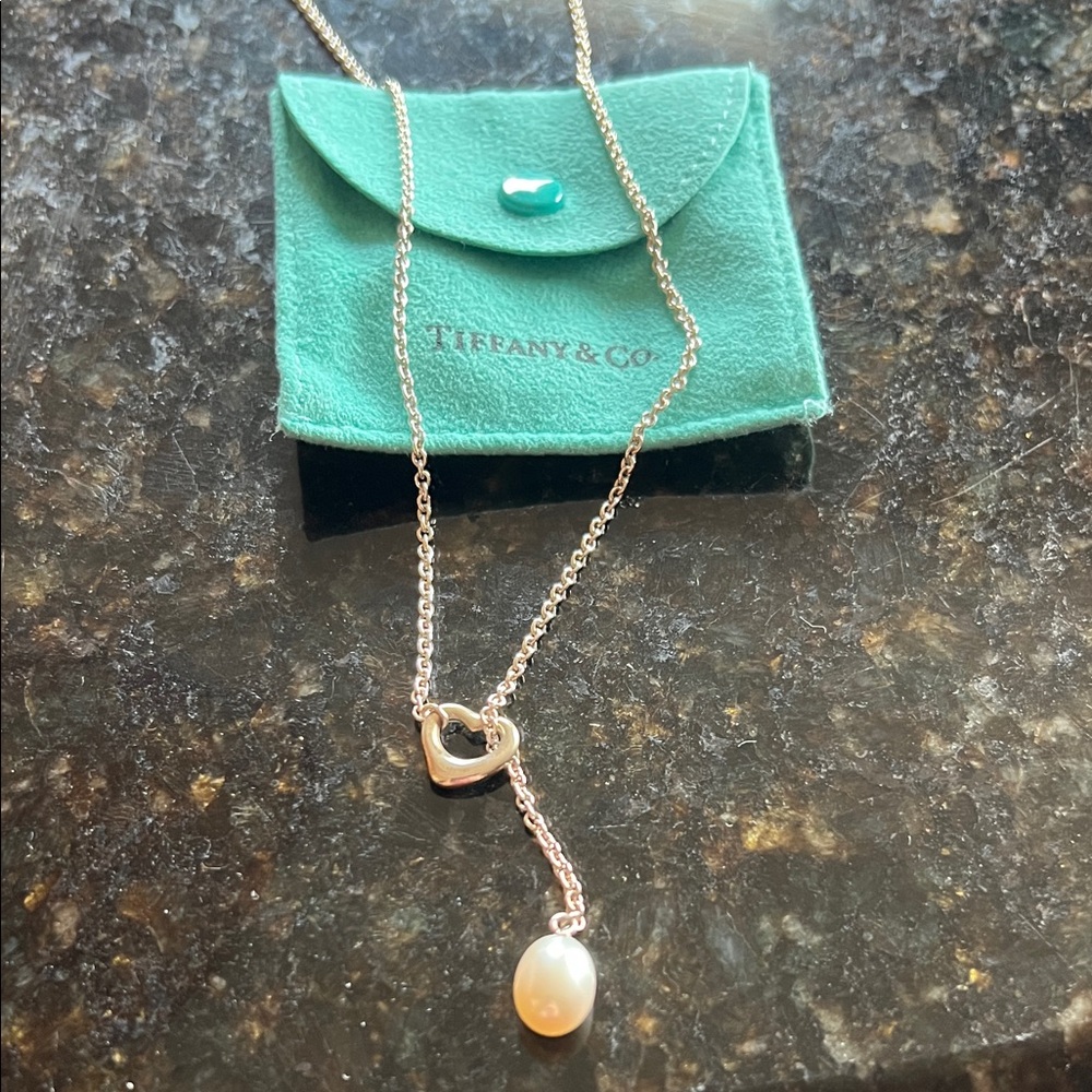 Auth Tiffany & Co. Silver Heart Lariat Necklace with Pearl Drop. Adjusts to 18”